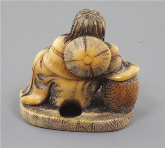 A Japanese ivory netsuke of Shojo, Meiji period, signed Ryumin, h. 3.3cm